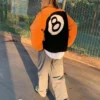 Stussy 8 Ball Reversible Sherpa Jacket Orange and Black Color (16)