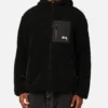 stussy 8 ball hooded black sherpa jacket reversible for men front closeup view