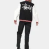 stussy world tour varsity jacket navy and white varsity jacket back full stussy logo view