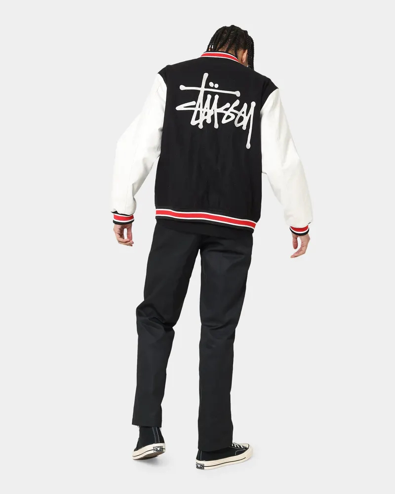 stussy world tour varsity jacket navy and white varsity jacket back full stussy logo view