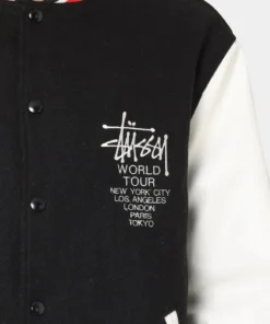 stussy world tour varsity jacket navy and white varsity jacket front closeup view
