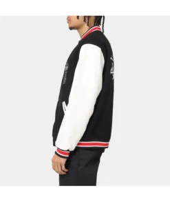 stussy world tour varsity jacket navy and white varsity jacket side view