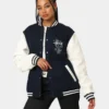 stussy world tour varsity jacket navy and white women varsity jacket front full view