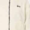 women wear a stussy reversible box fit sherpa jacket (9)