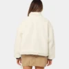 women wear a stussy reversible box fit sherpa jacket back sherpa side