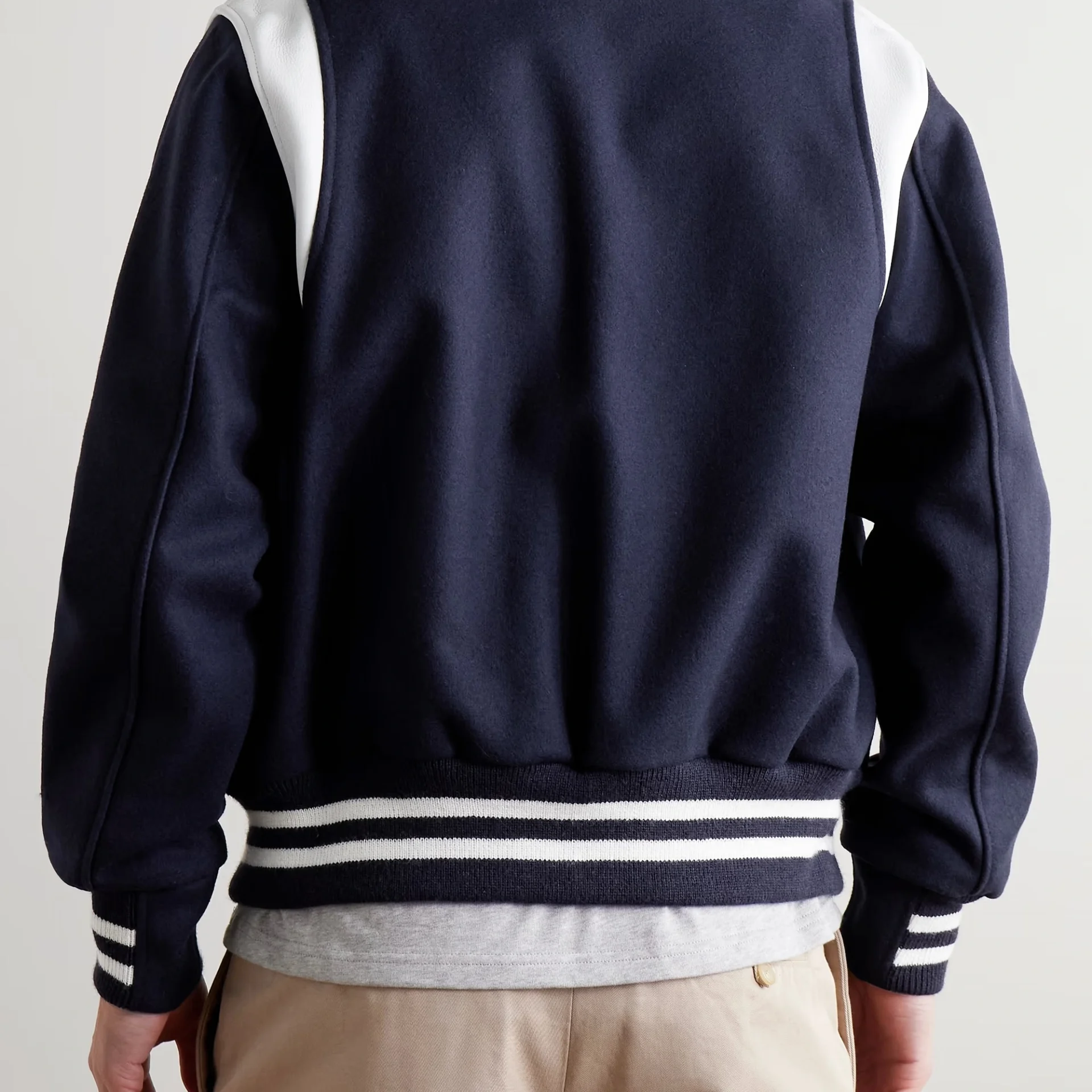letterman style navy and white varsity bomber back
