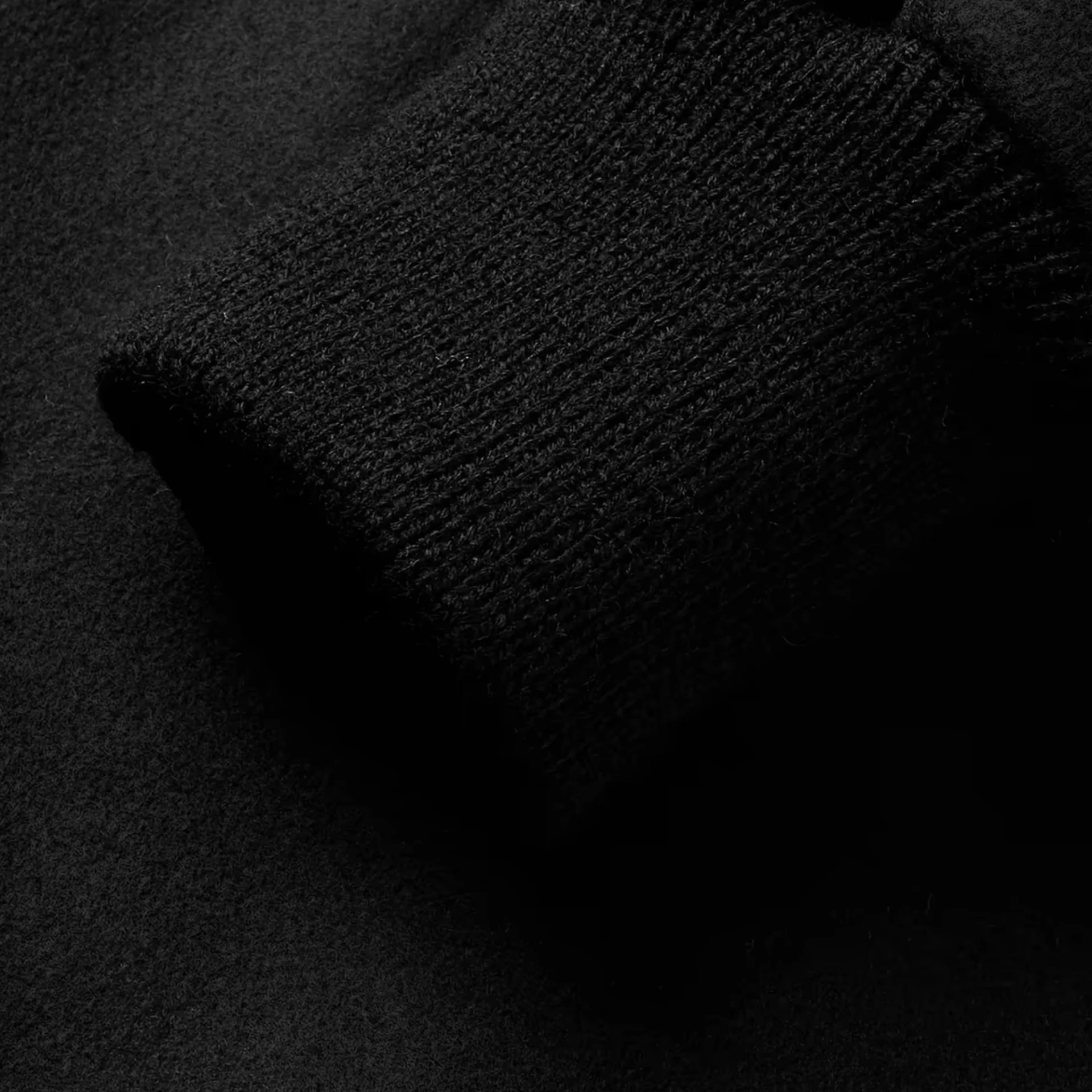 stussy leather trimmed wool varsity bomber jacket closeup