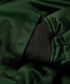 stussy light leaf green satin bomber jacket with black rib close up (2)