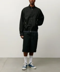 stussy surf team relaxed nylon harrington black jacket model front view