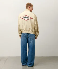 stussy surf team relaxed nylon harrington jacket light sand color back view