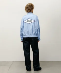 stussy surf team relaxed nylon harrington light sky jacket female back logo side